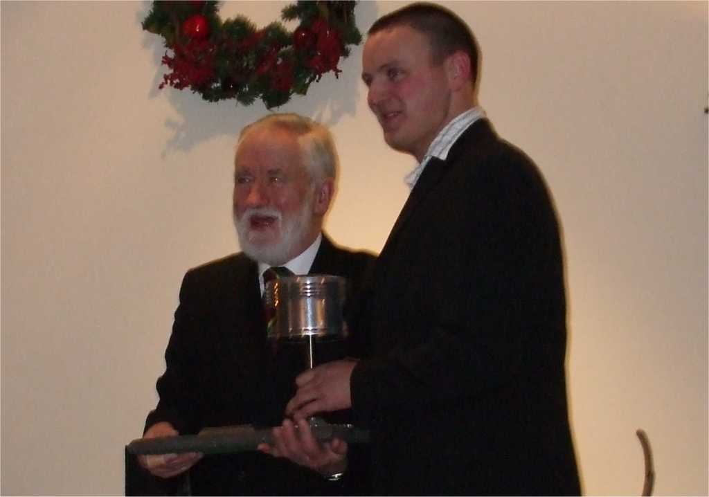 Denis Hogan presenting Piston award to Paul O'Connell